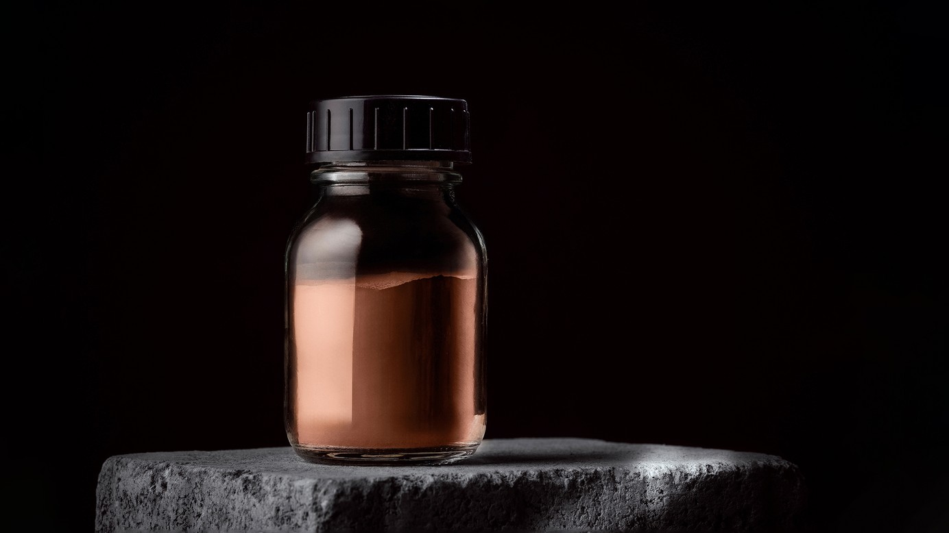 Osprey® C18150 in glass jar against a black background.